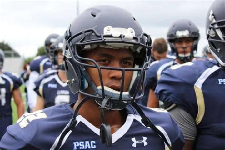 Do quarterbacks have mics in their helmets?