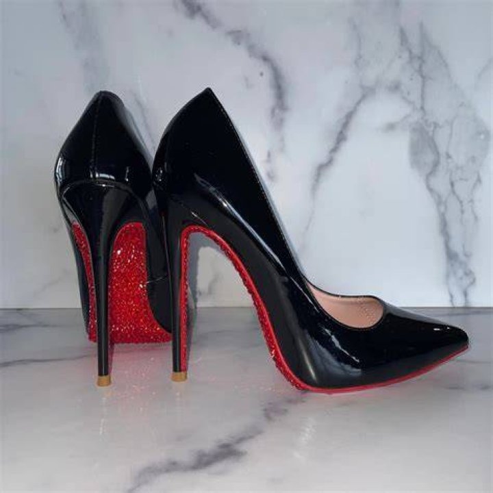 Which designer has red bottom shoes?